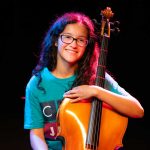 Photo of Aubriella Kolar with her cello