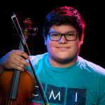 Photo of Michael A. Rodriguez with his violin