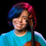 Photo of Valeria Tuesta with her violin